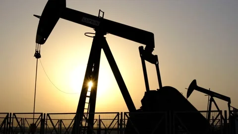 Crude oil extraction in Bahrain desert Stock Footage