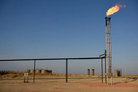 Crude oil production drilling site natural gas flare, flaring, or venting Stock Photos