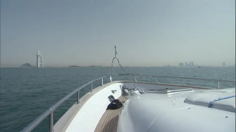 A Cruise boat sailing in the ocean while heading towards Dubai. Stock Footage 46865885