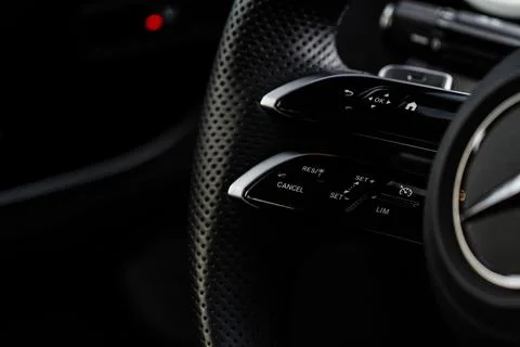 Cruise control switch closeup. Adaptive cruise control leaver. Cruise control Stock Photos