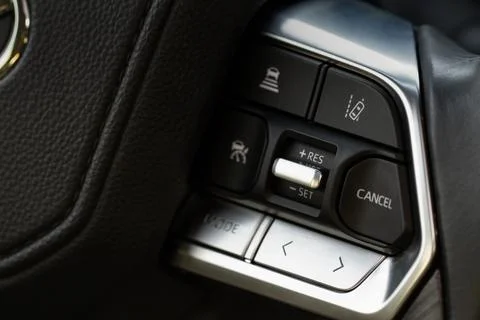 Cruise control switch closeup. Adaptive cruise control leaver. Cruise control Stock Photos