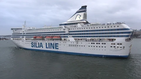 The cruise ferry Silja Symphony sails from Helsinki, cloudy March day. Finland Stock Footage 104401658
