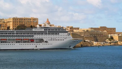 A cruise liner ship in front of Valletta, Malta Stock Footage 106916976