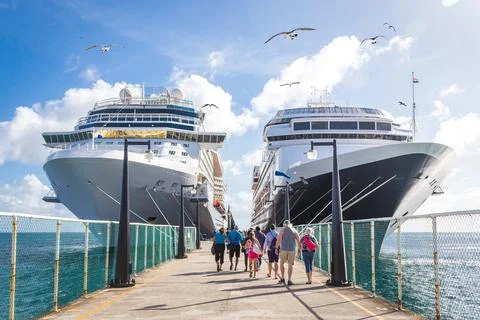 Cruise passengers return to cruise ships at St Kitts Port Zante cruise ship Stock Photos