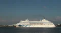 Cruise ship Aida Cara slowly leaving Kiel at Hanse Sail HD Footage