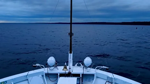 Cruise ship bow on a calm dark sea. Stock Footage 341107269