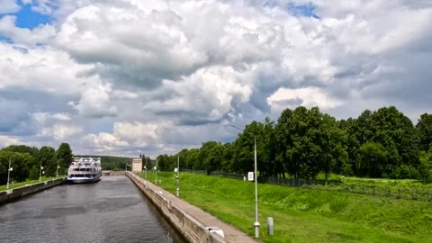 Cruise ship in a canal lock with clouds. Stock Footage 341791009