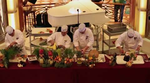 Cruise ship chef carving fruit and vegetables HD 6911 Stock Footage 24678073