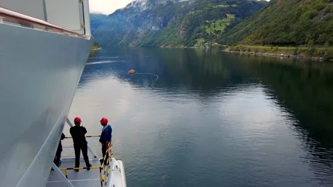 Cruise Ship Crew Prepare To Sail From Geiranger Norway Stock Footage 226966611