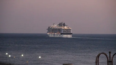 Cruise ship departing at sunset 03 Stock Footage 105604953