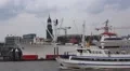 Cruise ship Europa pan from riverside in Hamburg harbour HD Footage