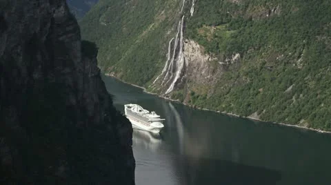 Cruise ship on the fjord at Geiranger, Norway Stock Footage