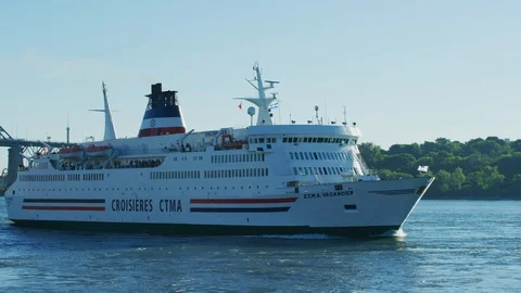 Cruise ship floating on a river Stock Footage 99912412