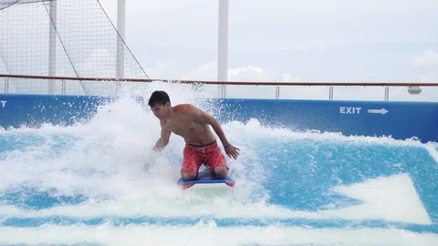Cruise ship flowrider surf simulator pool Royal Caribbean Stock Footage 116205334