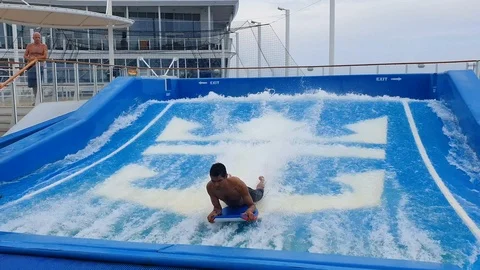 Cruise ship flowrider surf simulator pool Royal Caribbean Stock Footage 116205379