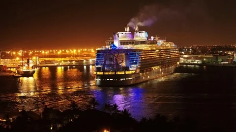 Cruise ship Harmony of the Seas returning at Port Everglades during night Stock Footage 116426239