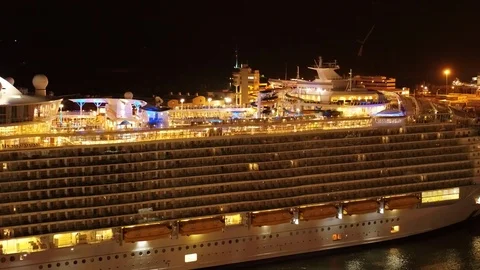 Cruise ship Harmony of the Seas returning at Port Everglades during night Stock Footage 116426543