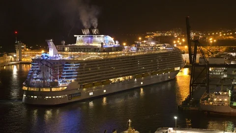 Cruise ship Harmony of the Seas returning at Port Everglades during night Stock Footage 117742704