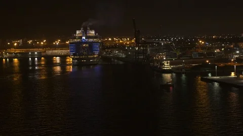 Cruise ship Harmony of the Seas returning at Port Everglades during night Stock Footage 117742772