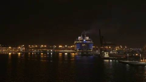 Cruise ship Harmony of the Seas returning at Port Everglades during night Stock Footage 117742874