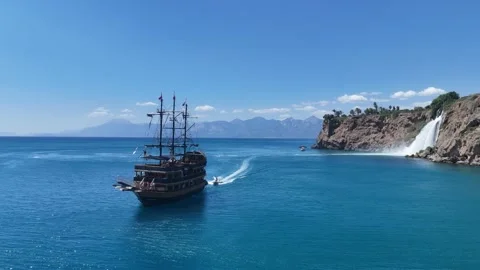 Cruise ship next to Duden waterfall in Mediterranean Sea Stock Footage 344029339