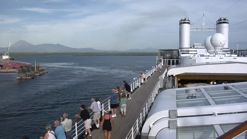 Cruise ship passengers on deck as ship manuevers in port Stock-Footage 90441676