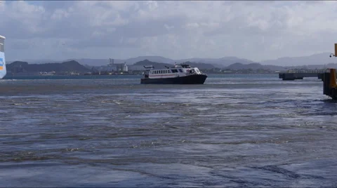 Cruise Ship Quantum of the Seas thrusters and ferry boat 3 Stock Footage 49795859