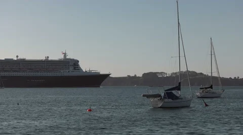 Cruise Ship Queen Mary 2 departing from Russell, Bay of Islands, New Zealand Stock Footage