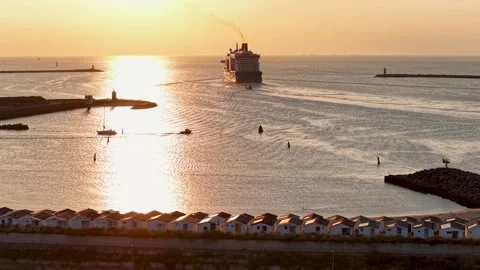 Cruise ship sailing out in the evening sun Stock Footage 344250271