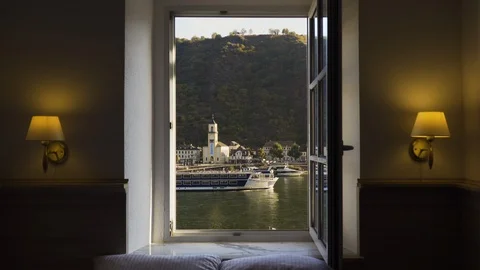 Cruise ship sailing past window overlooking the Rhine River. Stock Footage 96998488