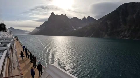 Cruise ship sails through mountainous Prince Christian Sound, Greenland Stock Footage 254999945