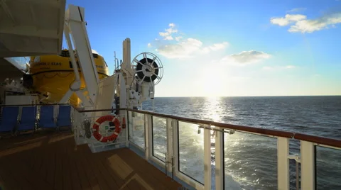 Cruise ship sea view at sunset from walking board or open deck Stock Footage