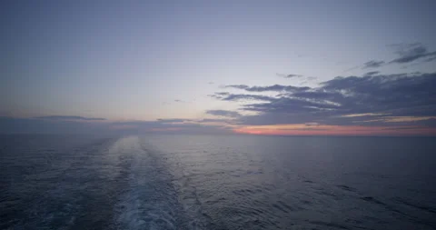 Cruise ship sunset back .sunset on the sea taken from the ship Stock Footage 240144131