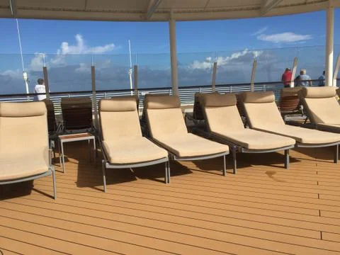 Cruise ship upper deck lounge chairs from Left JPG Stock Photos