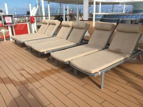 Cruise ship upper deck lounge chairs JPG Stock Photos