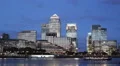 Cruise Sightseeing Tour Boat Passing Canary Wharf London Office Buildings Night HD Footage