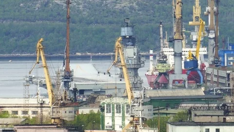 Cruiser "Admiral Kuznetsov" in his parking lot in the Murmansk sity. Video stock 80799214
