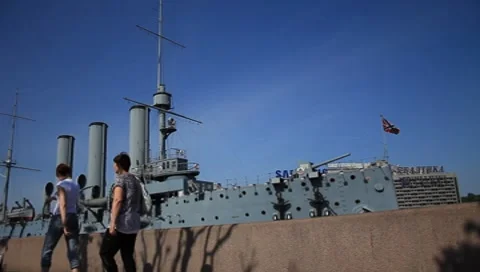 The cruiser Aurora moored on the Neva river in St. Petersburg Stock Footage 7750372