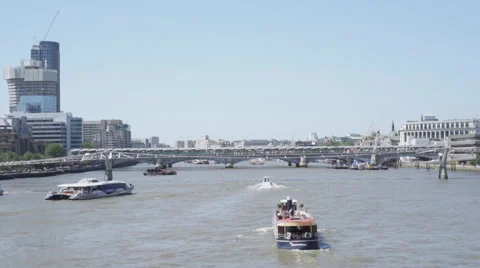 A cruiser heading up the Thames in London Stock Footage 65494528
