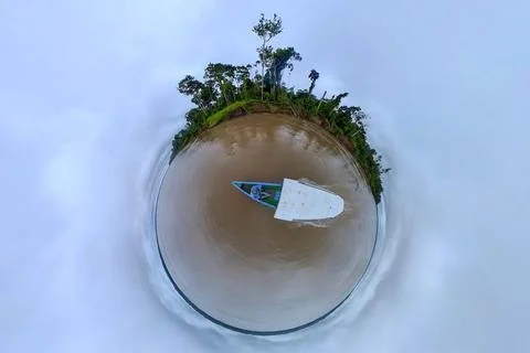 Cruising amazon river with typical amazonas boat tiny world 360 circular view Fotos de archivo