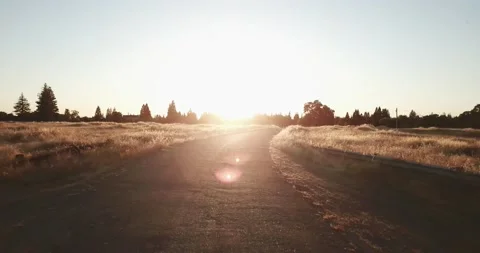 Cruising down sunset road Stock Footage 134911677