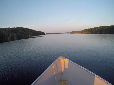 Cruising on the lake at sunset Stock Footage 77808971