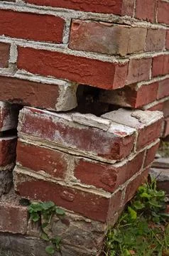 Crumbling brick foundation 스톡 사진