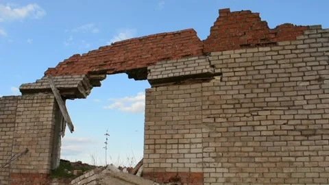 Crumbling brick wall against the sky Stock Footage 140492455
