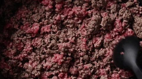 Crumbling Ground Beef with Silicone Spoon in Pan Extreme Close Up Top View 스톡 동영상 336570844