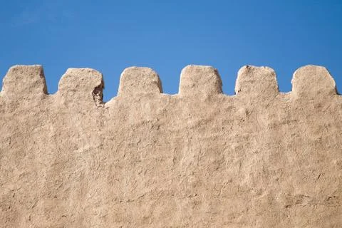 Crumbling mud wall Stock Photos