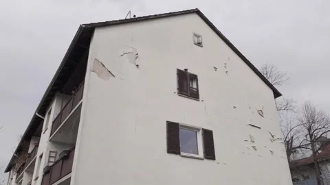 Crumbling plaster on a multi-family house in Bavaria, Germany Stock Footage 344809369