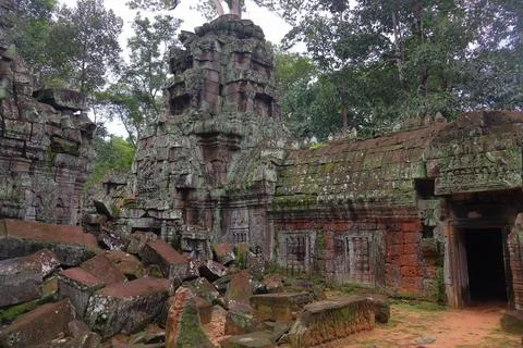 Crumbling Stone Blocks and Ancient Tower of Ta Nei Temple, Angkor, Cambodia Stock Photos