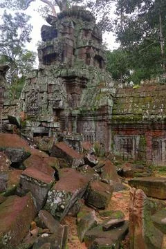 Crumbling Stone Blocks and Ancient Tower of Ta Nei Temple, Angkor, Cambodia Stock Photos