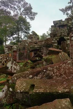 Crumbling Stone Blocks and Ancient Tower of Ta Nei Temple, Angkor, Cambodia Stock Photos